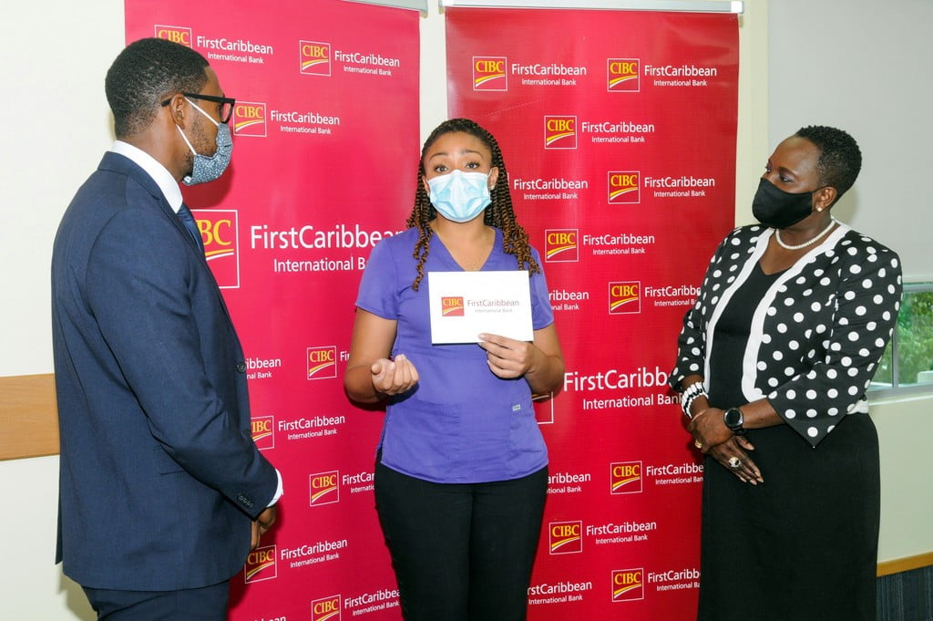 Kimberley Cumberbatch (centre) explains the work of a Respiratory Therapist to judges Raymond Ward (left) and Michelle Whitelaw (right)