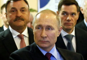 Britain claims Andrey Guryev Sr. (left) was a "known close associate of Vladimir Putin."