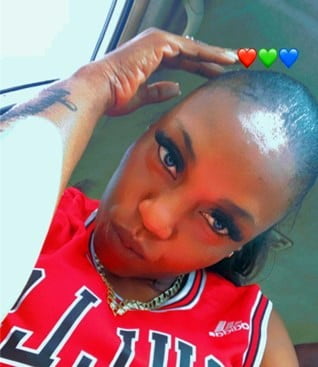 She also has a tattoo on her lower left leg with candies and cupcakes. At the time she was wearing a white, blue and red Tommy Hilfiger shirt, long blue jeans with a pair of brown Michael Kors slides on her feet.