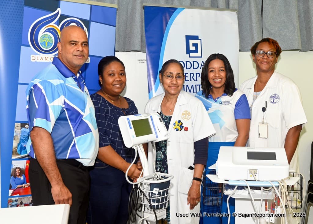 The GEL Team stand with the resuscitated equipment and the QEH team from left- Anthony Ali, Marianna Shepherd, Dr. Anne Marie Cruickshank, Dr. Joanne Bradford-King and Lee-Ann Millar Mendes the Group VP of HR and Shared Services at GEL