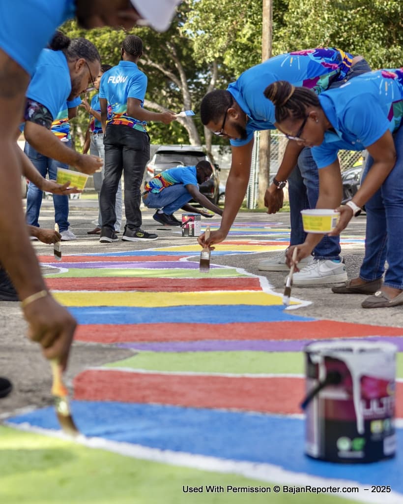 Flow staff painting the alphabet and numbers at Erdiston Special School.