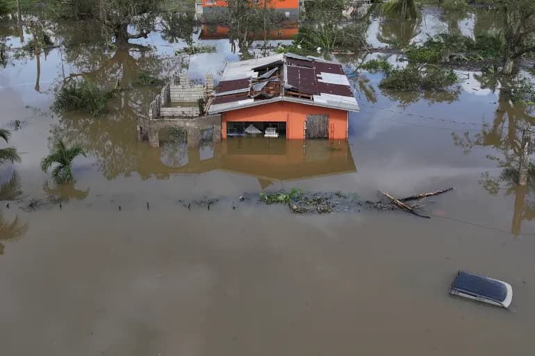 An aerial view shows widespread flooding in St. Elizabeth, Jamaica, after Hurricane Melissa made landfall. Photo Credit - Maria Alejandra Cardona