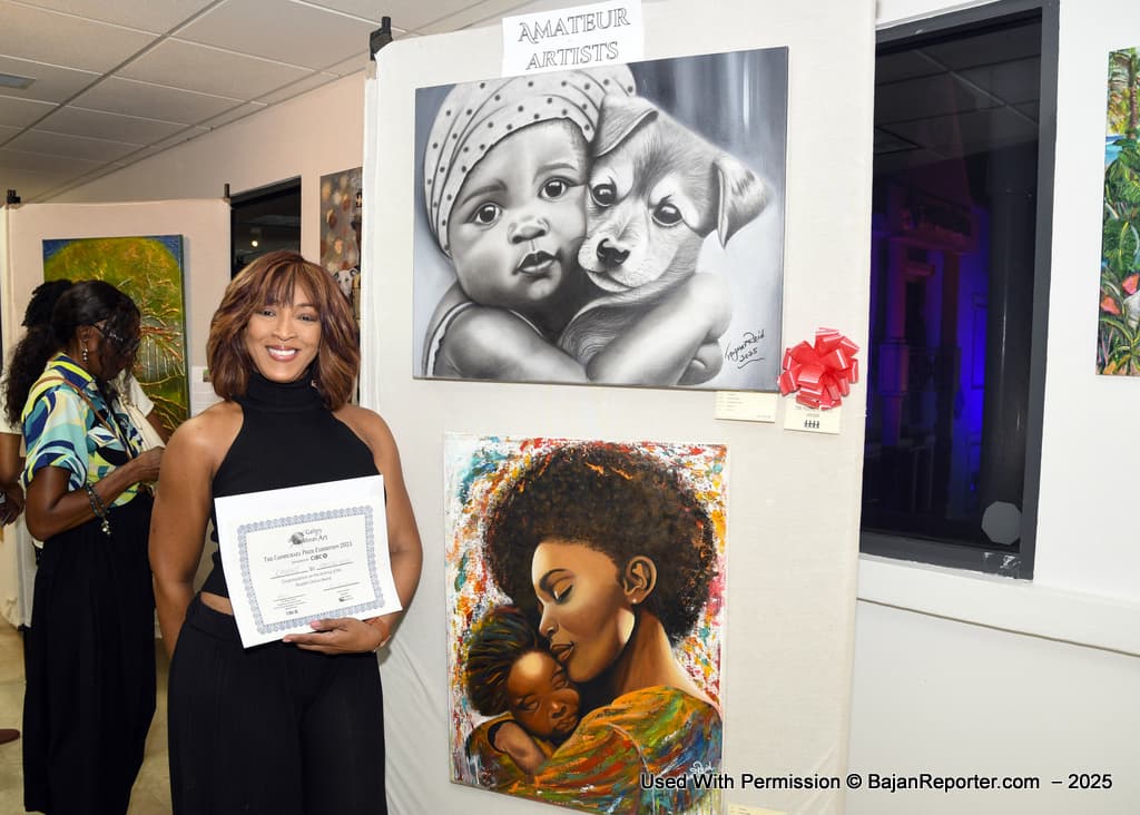 Taymar Reid poses with her People’s Prize Certificate next to her winning Charcoal rendition “Embrace”
